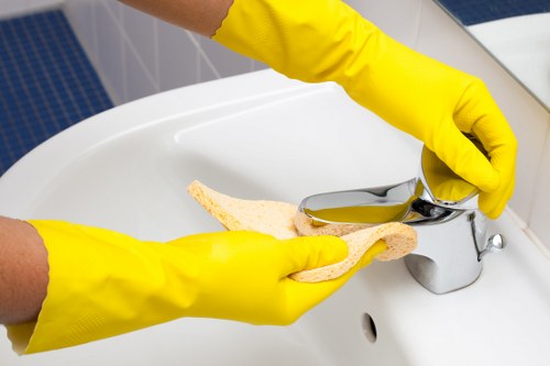 Local office cleaning team working after hours in SW18